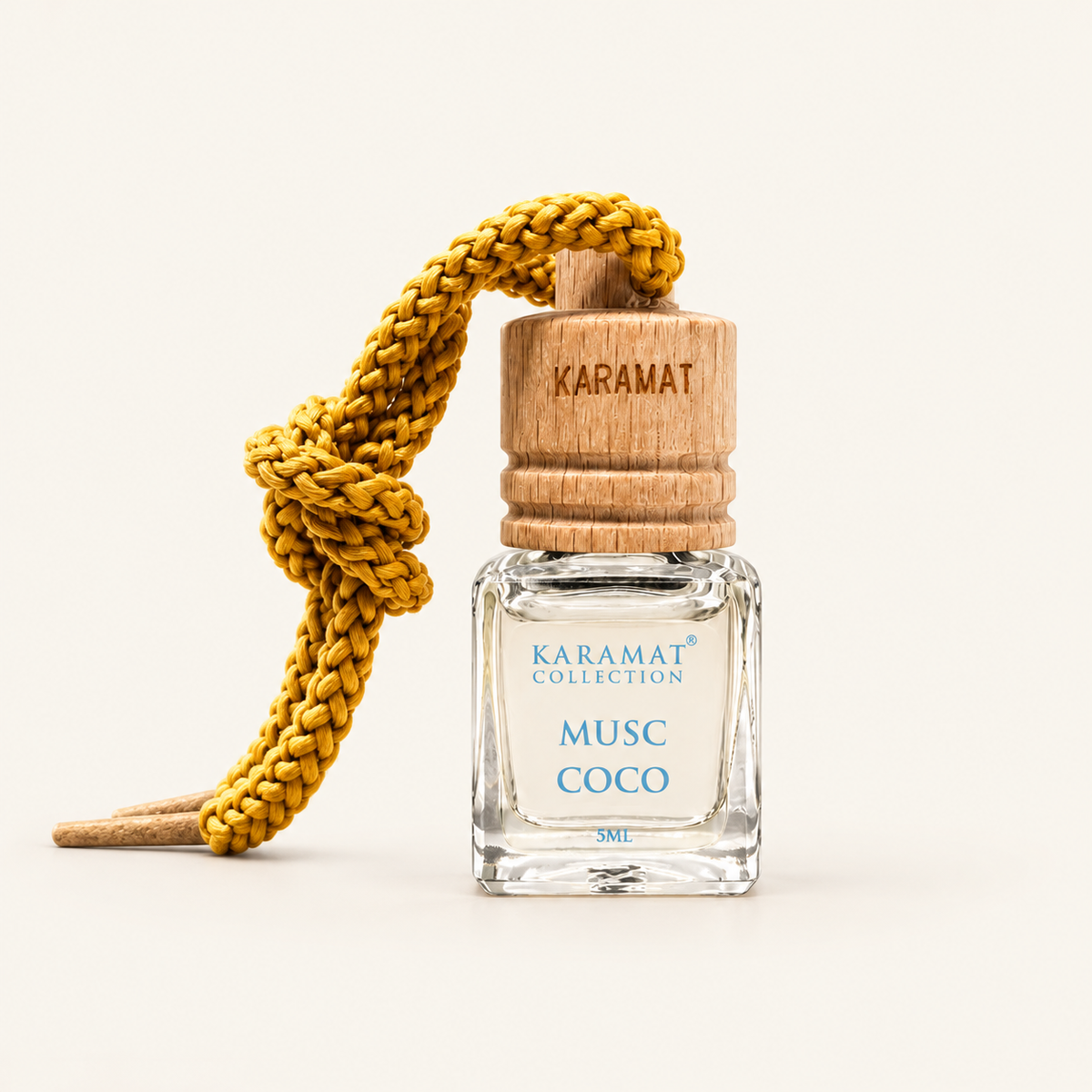 Musc Coco 5 ml – Parfum Voiture — produit sur fond crème