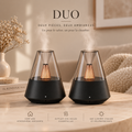 Deux diffuseurs d'ambiance Brume Solveine côte à côte, dôme effet verre et lumière chaude, duo pour le salon et la chambre
